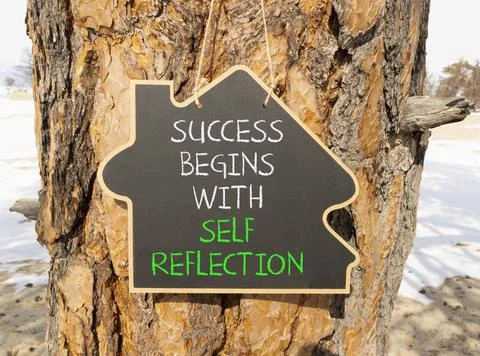 Self reflection symbol. Concept words Success begins with self reflection o.. Stock Photos