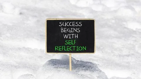 Self reflection symbol. Concept words Success begins with self reflection o.. Stock Photos