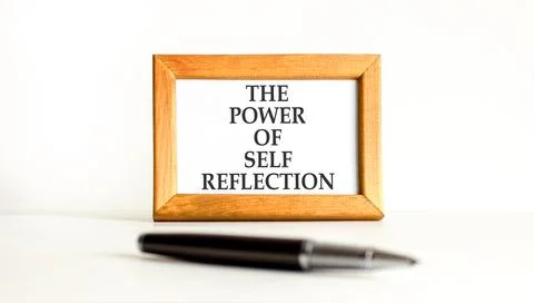 Self reflection symbol. Concept words The power of self reflection on beautif Stock Photos
