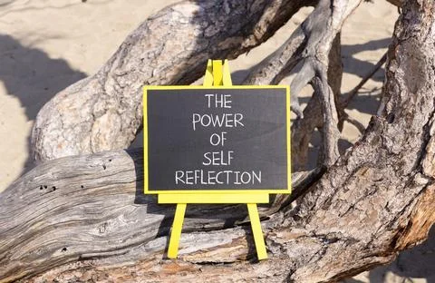Self reflection symbol. Concept words The power of self reflection on beautif Stock Photos