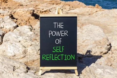 Self reflection symbol. Concept words The power of self reflection on beautif Stock Photos