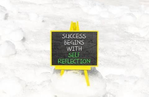 Self reflection symbol. Concept words Success begins with self reflection o.. Stock Photos