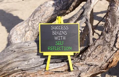 Self reflection symbol. Concept words Success begins with self reflection o.. Stock Photos