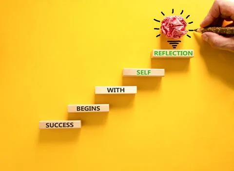 Self reflection symbol. Concept words Success begins with self reflection o.. Stock Photos