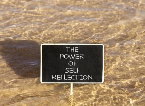 Self reflection symbol. Concept words The power of self reflection on beautif Stock Photos