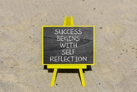Self reflection symbol. Concept words Success begins with self reflection o.. Stock Photos