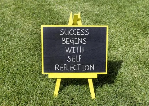 Self reflection symbol. Concept words Success begins with self reflection o.. Stock Photos