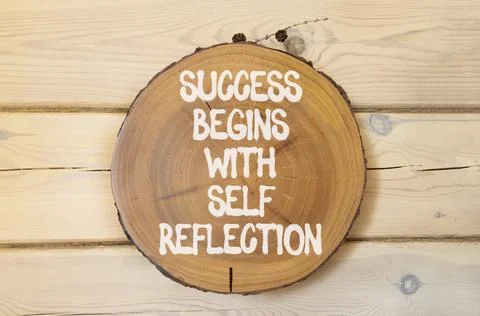 Self reflection symbol. Concept words Success begins with self reflection o.. Stock Photos