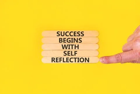 Self reflection symbol. Concept words Success begins with self reflection o.. Stock Photos