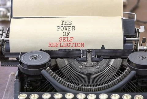 Self reflection symbol. Concept words The power of self reflection typed on o Stock Photos