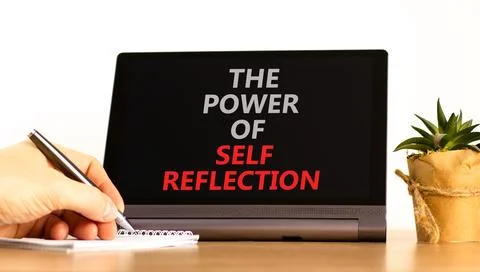 Self reflection symbol. Concept words Success begins with self reflection on  Stock Photos