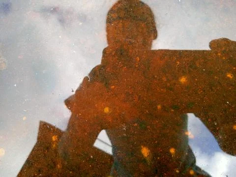 Self reflection in water 写真素材