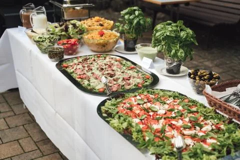 Self-service buffet table with various vegetable and meat snack. Celebration Stock Photos