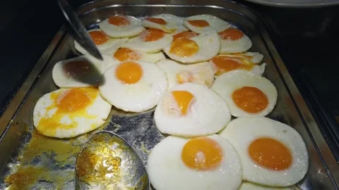 Self service restaurant witn trays of sunny side up fried eggs, organic healt 스톡 동영상 330100700