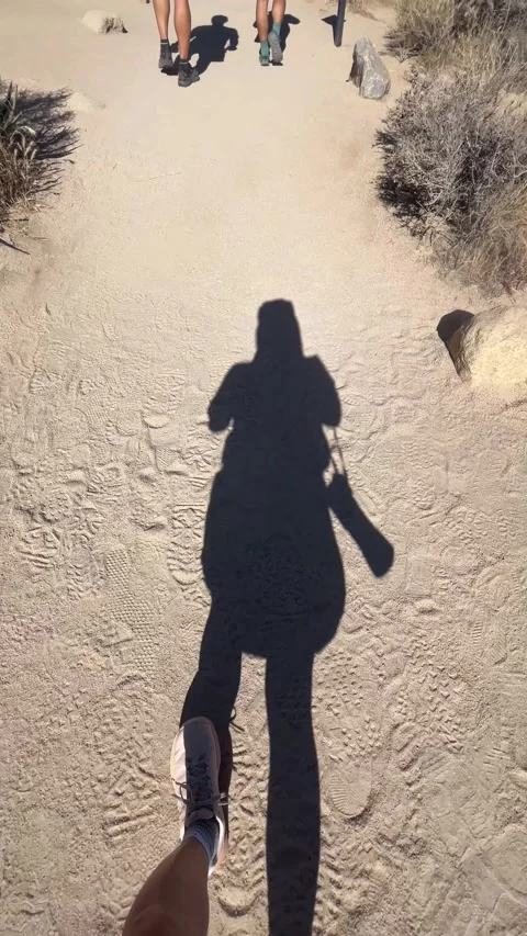 Self Shadow Walking POV on Hidden Valley Nature Trail Joshua Tree Stock Footage 337080042