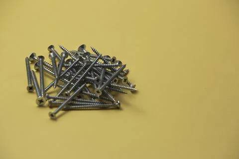 Self-tapping a orange background Stock Photos