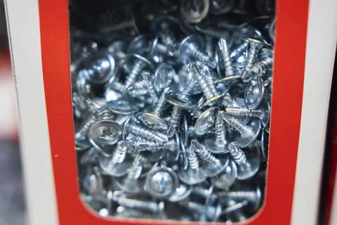 Self-tapping screw with a drill, galvanized hardware with a drill at the end Stock Photos