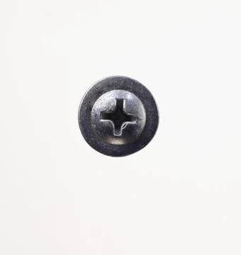 Self-tapping screw head with press washer and cross slot. Stock Photos