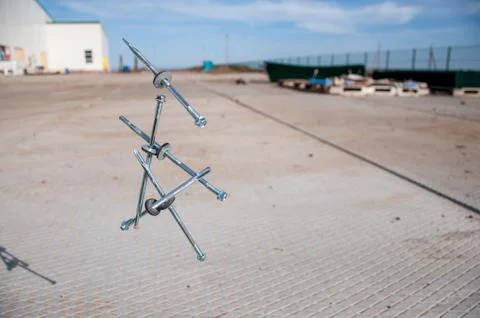 Self-tapping screws falling into the air for sandwich panels. 스톡 사진