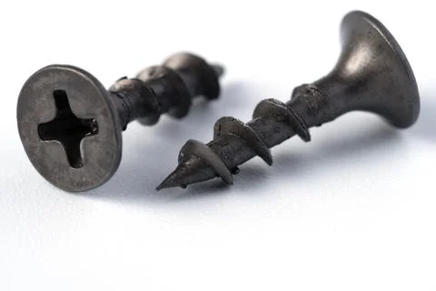 Self-tapping screws on a white background. close-up. Stock Photos