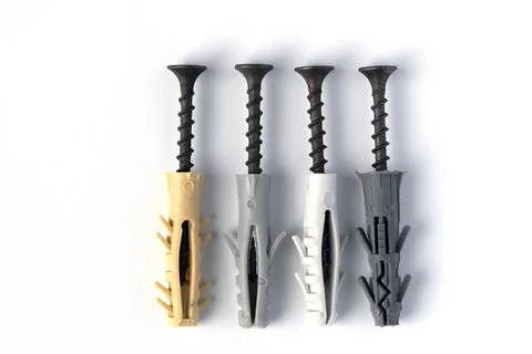 Self-tapping screws on a white background. close-up. Stock Photos