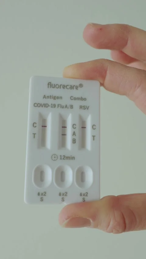 Self-test kit for COVID-19 and influenza in a real home environment. Video stock 328348102