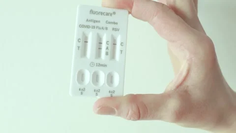 Self-test kit for COVID-19 and influenza in a real home environment. Video stock 328348231