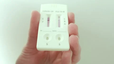 Self-test kit for COVID-19 and influenza in a real home environment. Video stock 328348252
