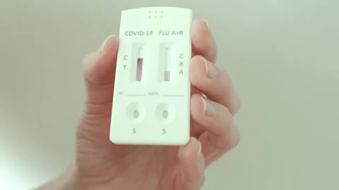 Self-test kit for COVID-19 and influenza in a real home environment. Stock Footage 328348264