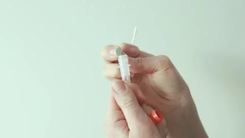 Self-test kit for COVID-19 and influenza in a real home environment. Stock Footage 328348274