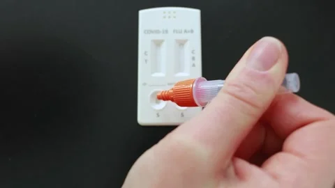 Self-test kit for COVID-19 and influenza in a real home environment. Stock Footage 328348294