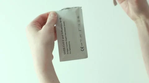 Self-test kit for COVID-19 and influenza in a real home environment. Video stock 328348301
