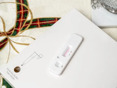 Self-test kit for Covid-19 showing negative result at Xmas Stock Photos