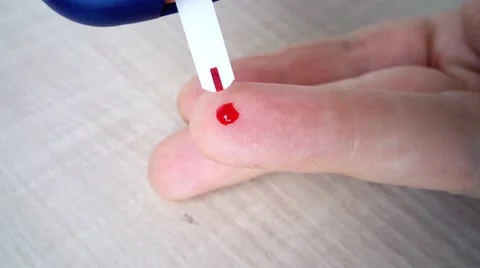 Self testing of blood for sugar Stock Footage 68978500