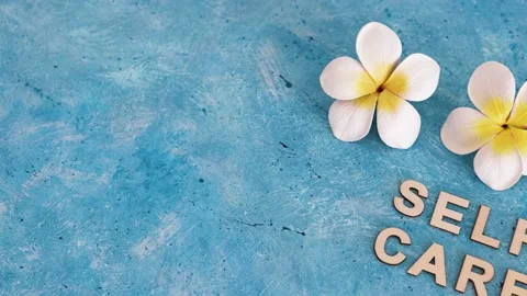 Self-worth conceptual video, Self care text with blue background and camera p Stock Footage 136138887