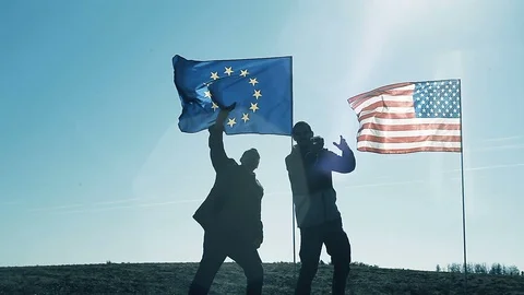 Selfie on the background of the EU flag and the flag of America. Stock Footage 95834702