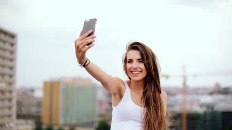 Selfie with city in background Stock Footage 54544396