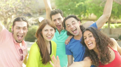 Selfie, Close up of five jolly friends posing for self timer photo Stock Footage 39834646