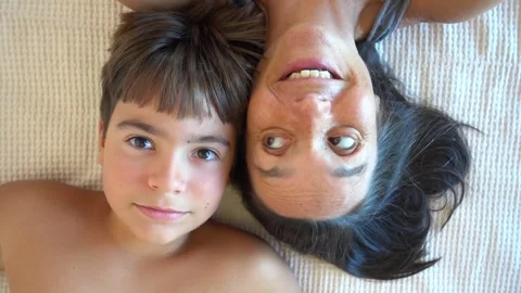 Selfie faces of young son and his aging mother Stock Footage 250450853