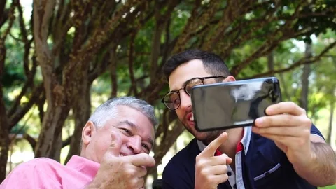 Selfie of Father and Son Stock Footage 79899059