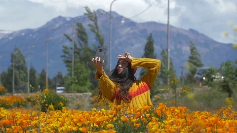 A Selfie in a flowers field Stock Footage 129513243