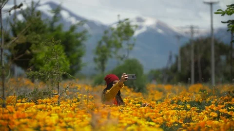 A Selfie in a flowers field Stock Footage 129513898