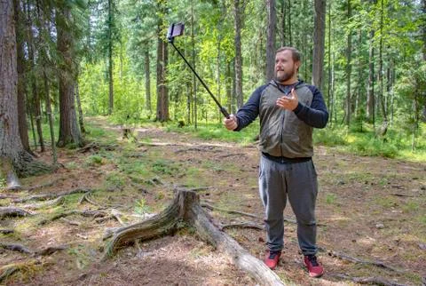 Selfie in the forest. Stock Photos