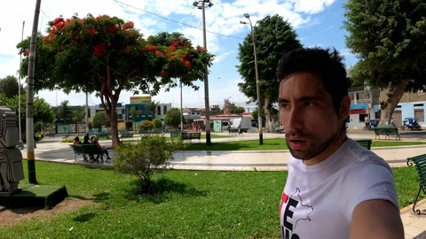 Selfie man running through the main square of Casma in point of view in the day Stock Footage 197088033