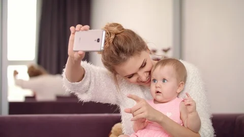 Selfie mom and daughter at home. Beautif... | Stock Video | Pond5