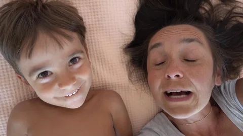 Selfie mother scolds her son and he pulls her nose 2, child Stock Footage 80447692