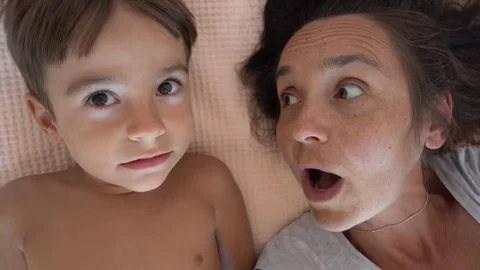 Selfie mother scolds her son and he pulls her nose, child Stock Footage 80448457