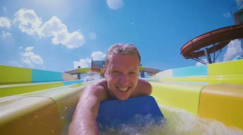 Selfie in motion on a fun water slide in slow motion Video stock 66515580