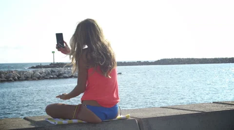 Selfie by the ocean Stock Footage 66201566