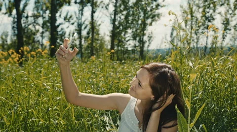 Selfie on sunny meadow Stock Footage 66996463